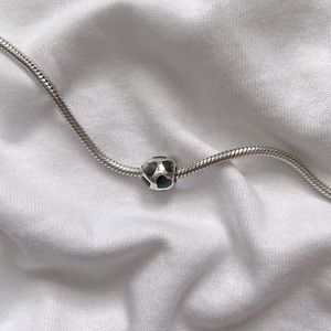 Authentic pandora 925 silver threaded core heart charm.